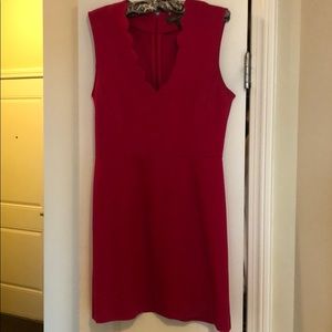 Pink dress with scalloped fabric touches!